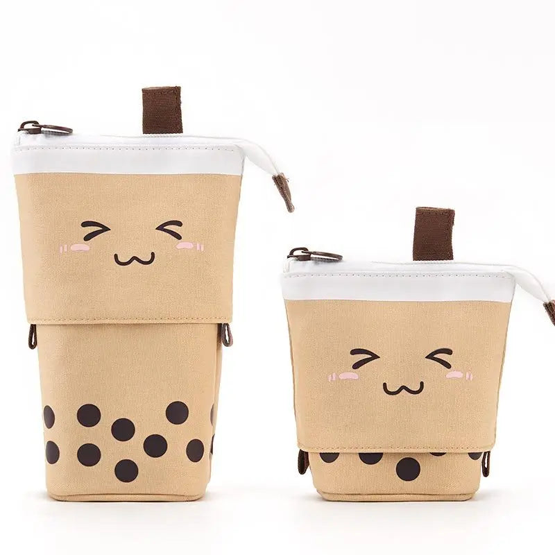 Canvas pencil pouch with zipper, tan cat face and black polka-dot lower section.