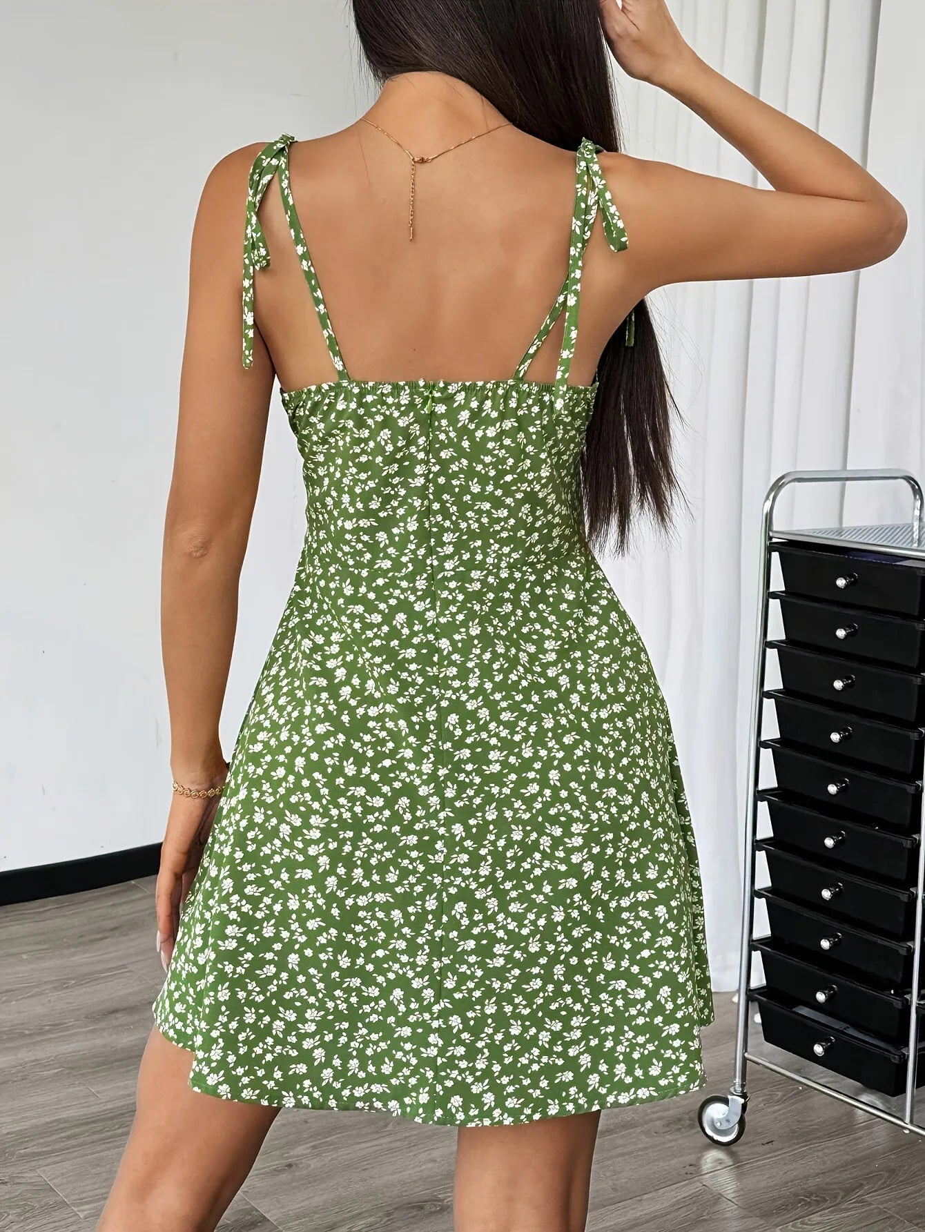 Green floral spaghetti strap short dress with tie shoulders and square neckline