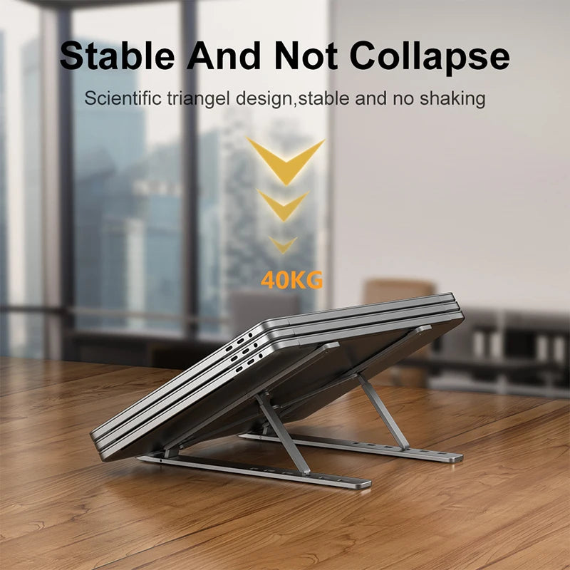 Silver portable laptop stand with stable triangular legs and anti-shake design
