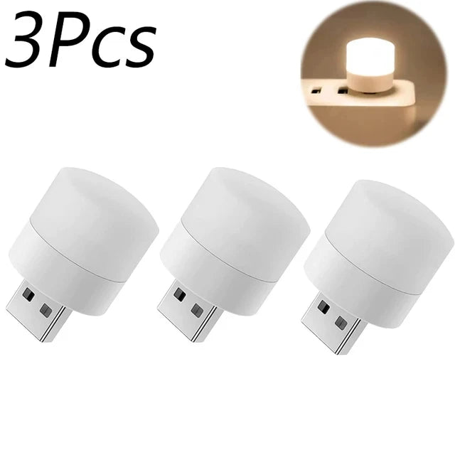 Set of three white USB mini night light bulbs with small round glowing tops