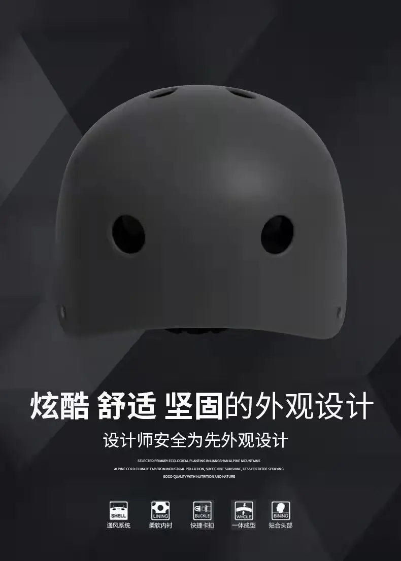 Kids bike helmet with smooth matte dark shell and large ventilation openings.