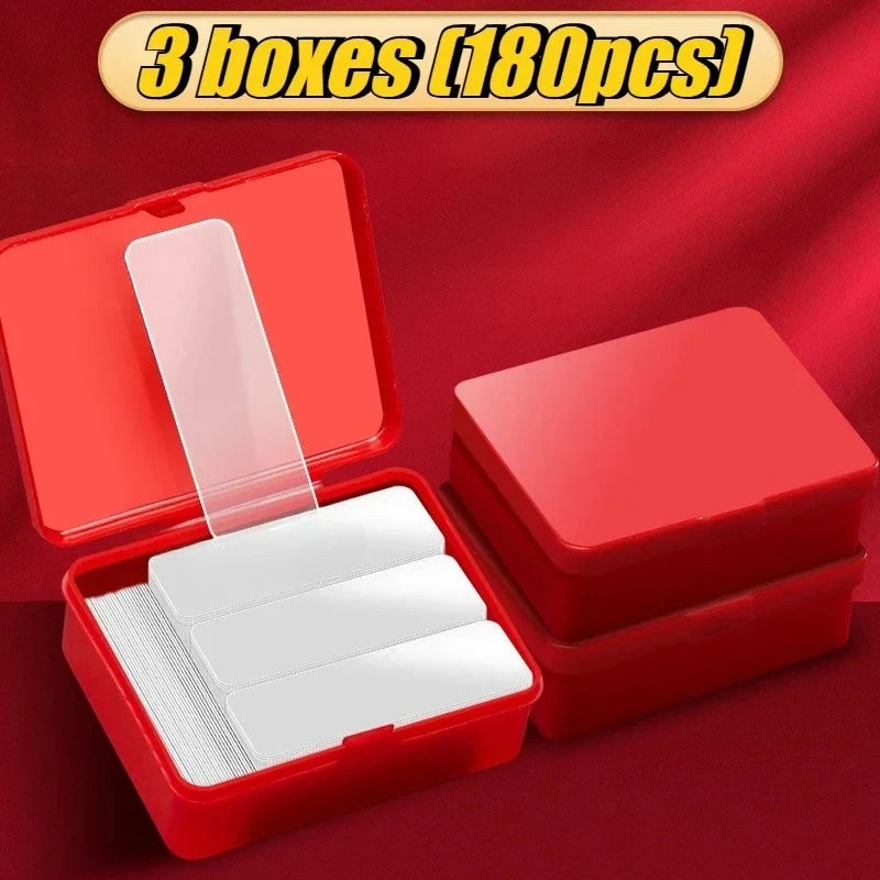 Double-sided adhesive mounting tape strips in red plastic organizer box