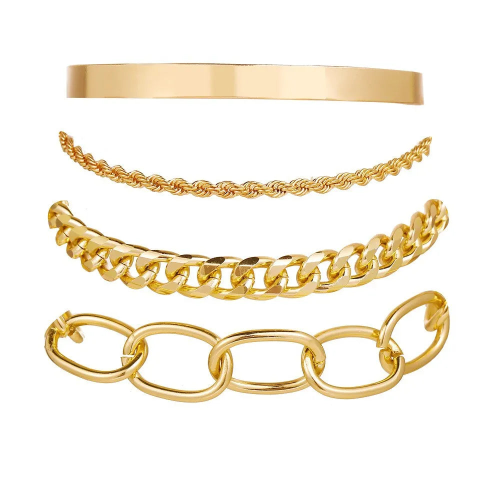 Gold-tone braided chain and oval-link bracelets with smooth wide cuff bangle
