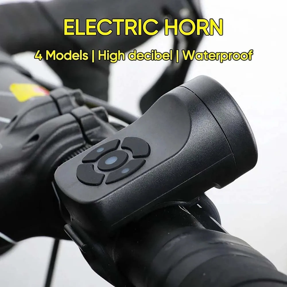 Black electric bicycle horn mounted on handlebar with rounded control housing