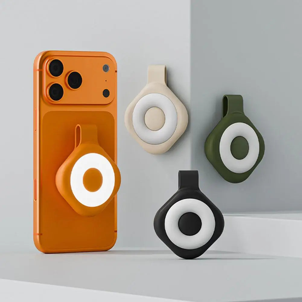Set of mini magnetic LED phone lights in orange, beige, black, and green