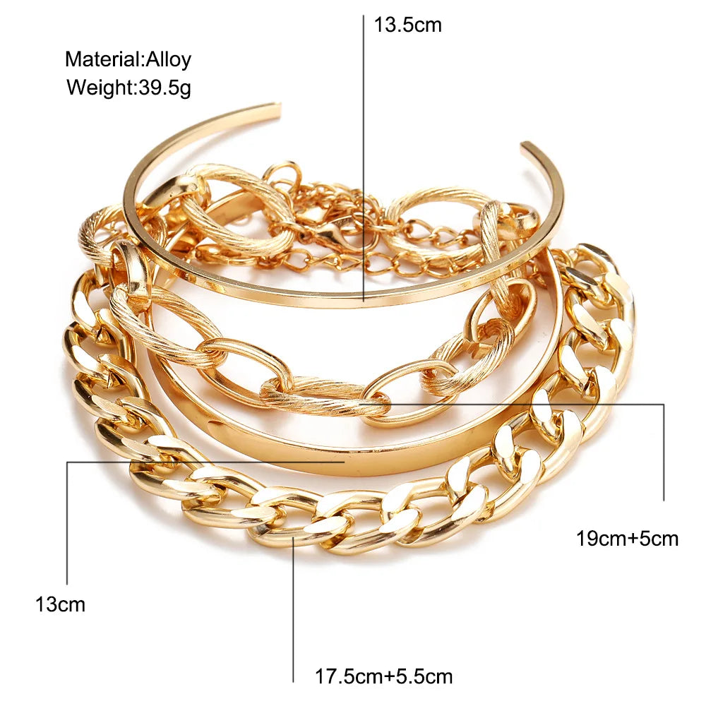 Gold chain bangle bracelet set with multiple open cuffs and layered link bands