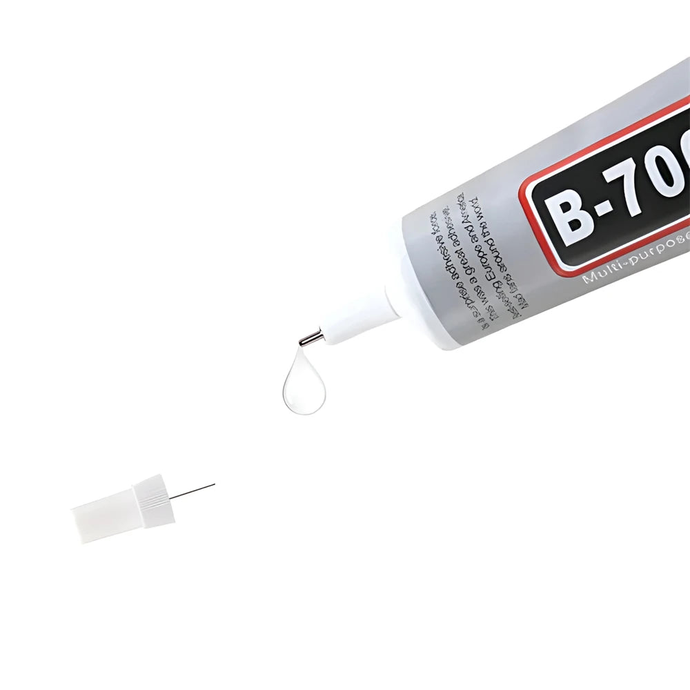 Clear contact adhesive tube with white precision nozzle and drop tip