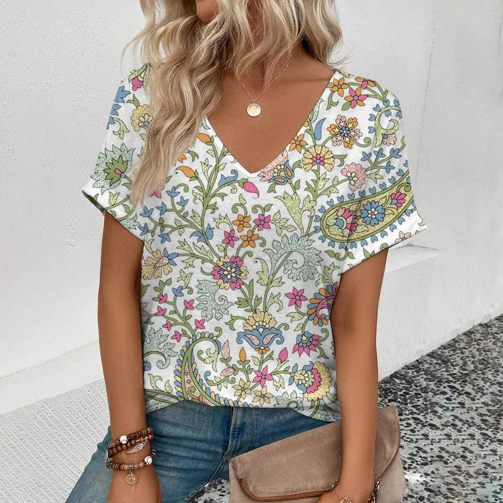 Women's plus-size V-neck t-shirt with short sleeves and blue paisley floral print