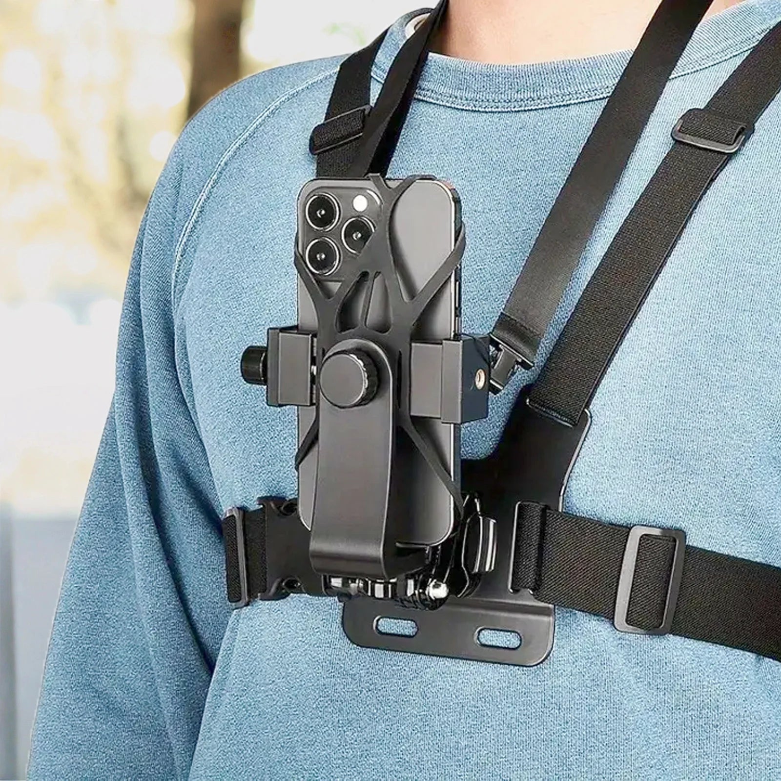 Adjustable chest strap mount with black camera/phone holder and shoulder harness