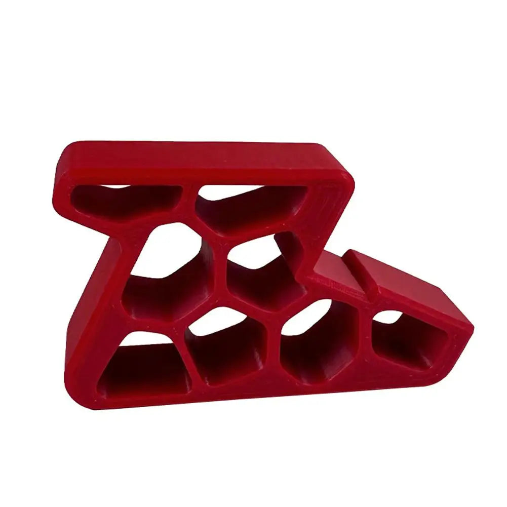 Red door stop wedge with track lock and anti-slip honeycomb grid pattern