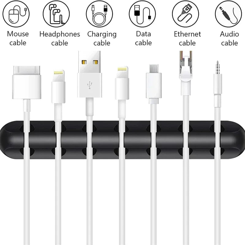 White cable organizer snap clips with multiple cable ends routed through slots