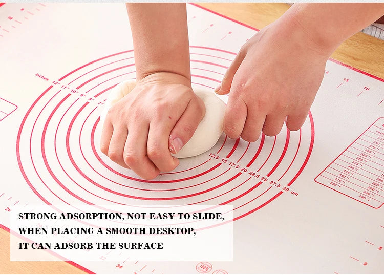 Silicone dough mat with red concentric ring lines, dough smoothing by hands