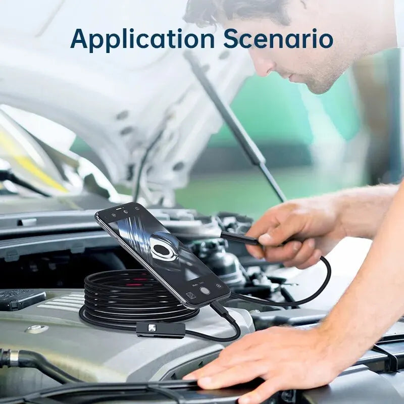 Endoscope camera in use with flexible probe pointed into car engine bay