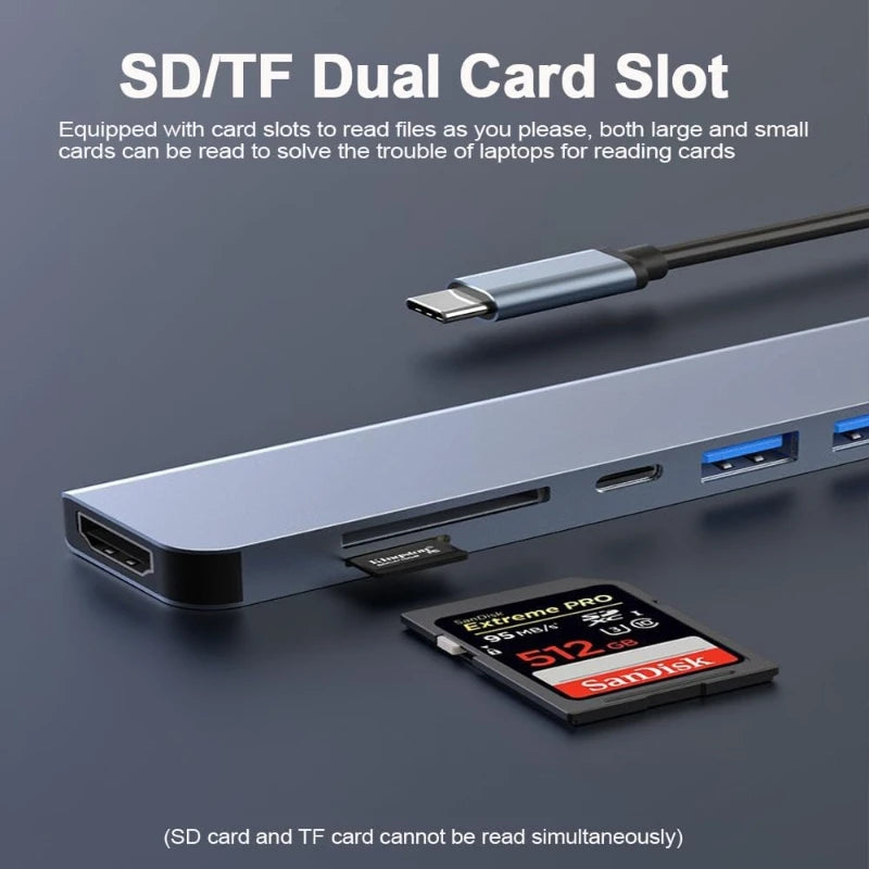 USB-C hub with dual SD/TF card slots and USB ports on a slim aluminum body