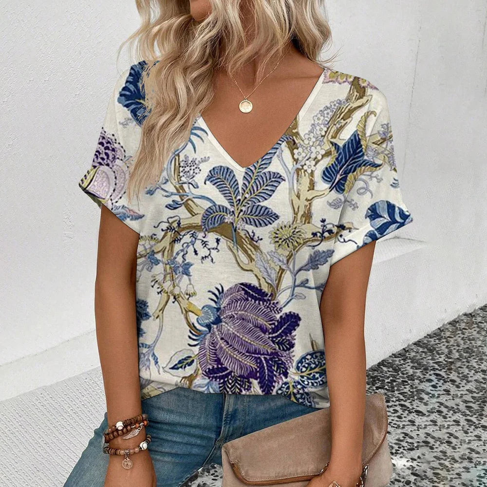 Women's plus-size V-neck T-shirt, white with blue botanical floral print.