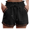 Black cotton-linen shorts with elastic waist, drawstring, side pockets, cutout trim