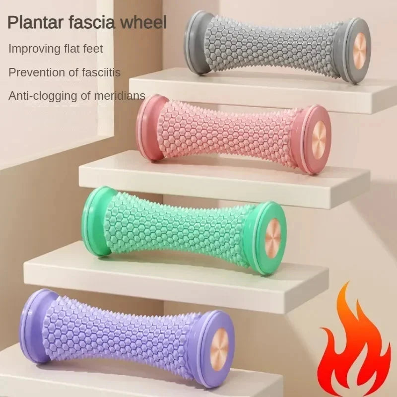 Set of foot massage rollers with textured honeycomb wheels in gray, pink, green, and purple