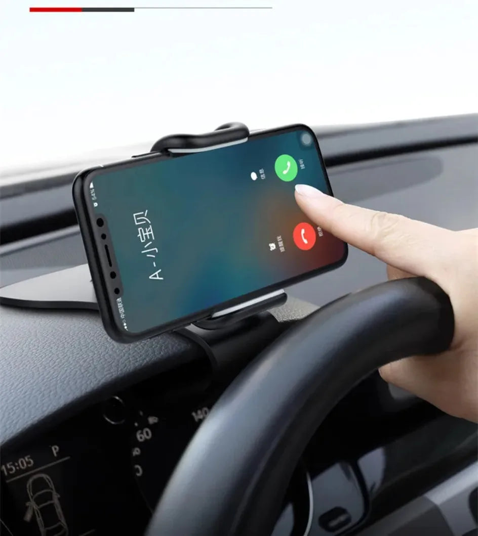 Dashboard car phone holder securely holding a smartphone with spring grip
