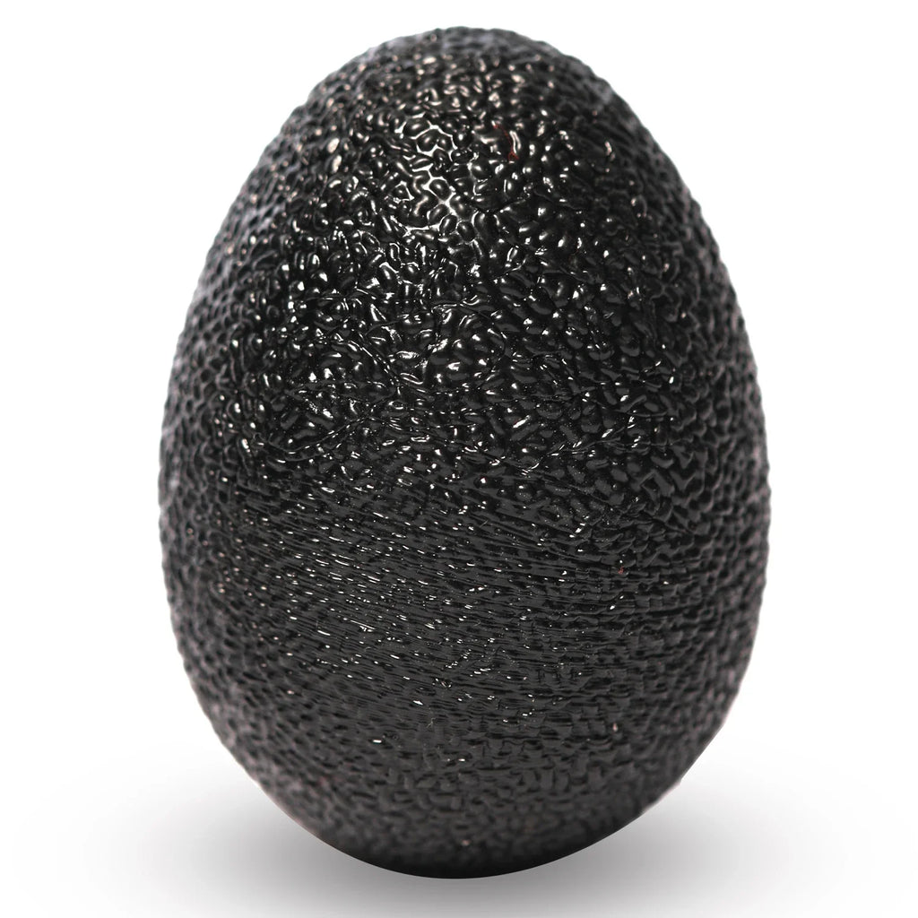 Black egg-shaped grip exercise ball with textured bumpy surface.