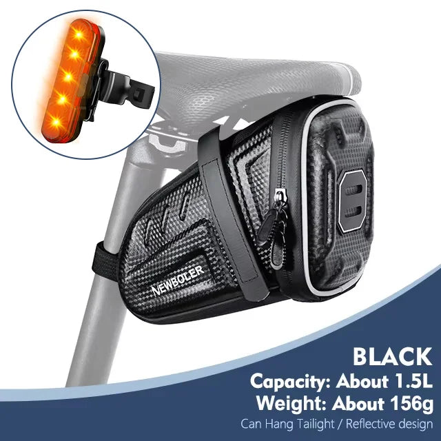 Waterproof black saddle tool bag with rear light and reflective trim on bike frame