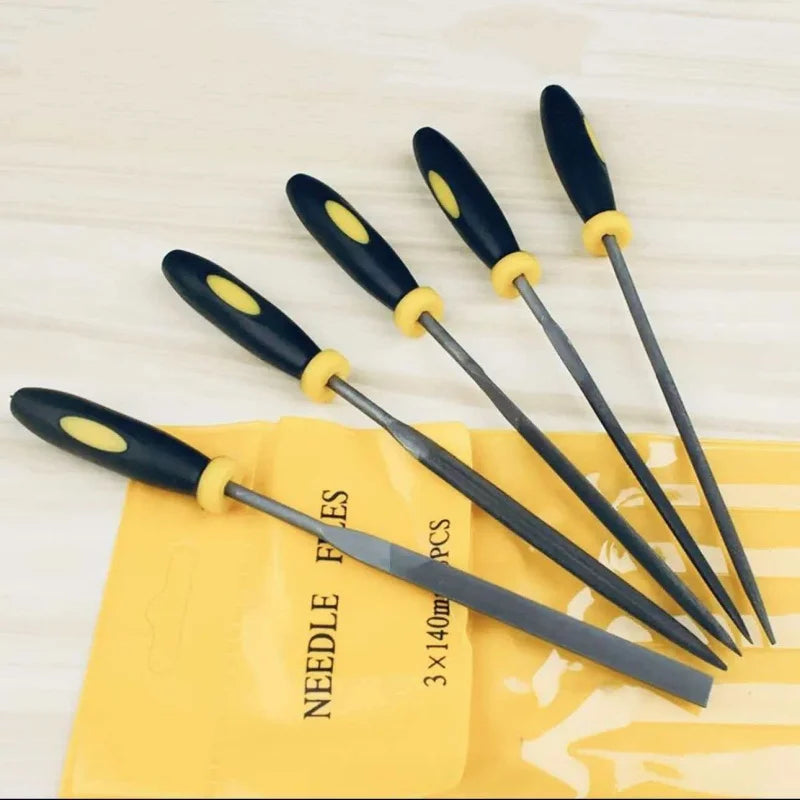Set of needle files with black handles and yellow caps