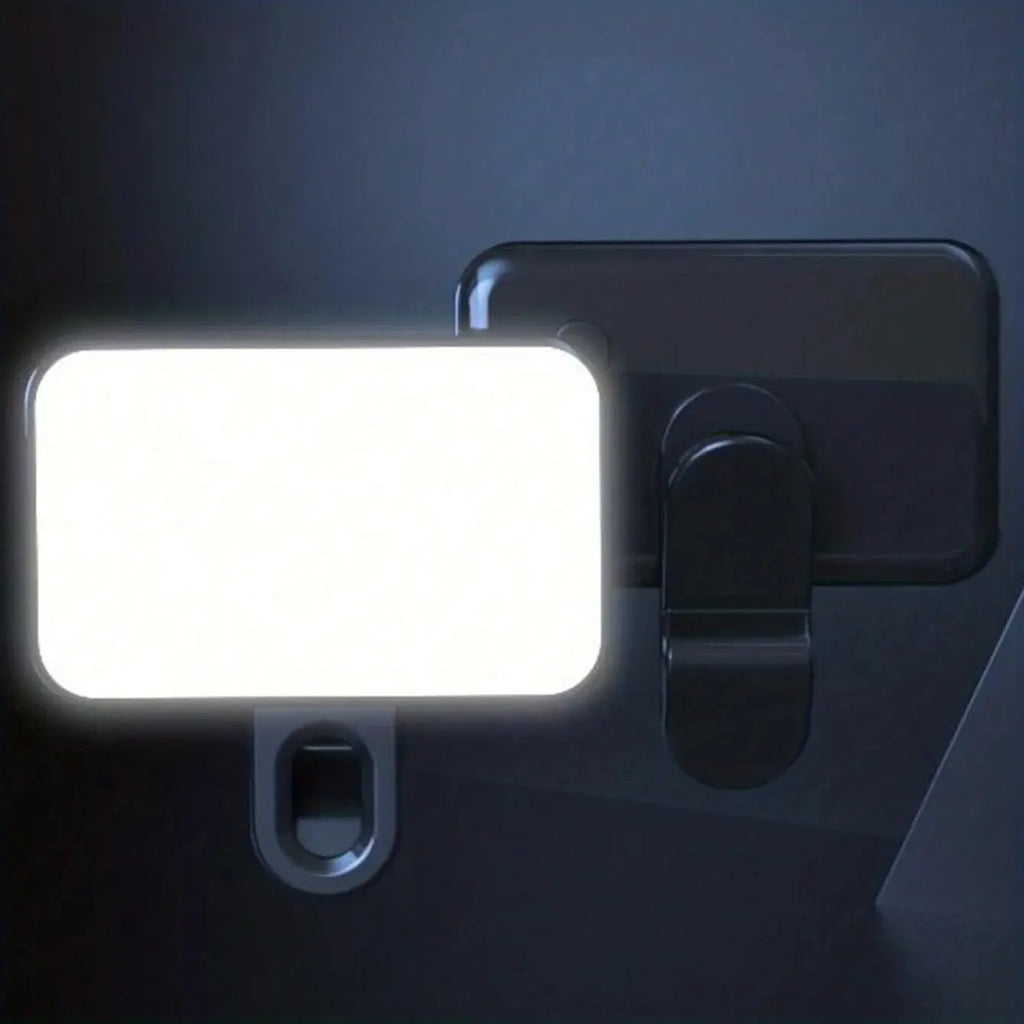 Black clip-on mini LED fill light showing bright light panel