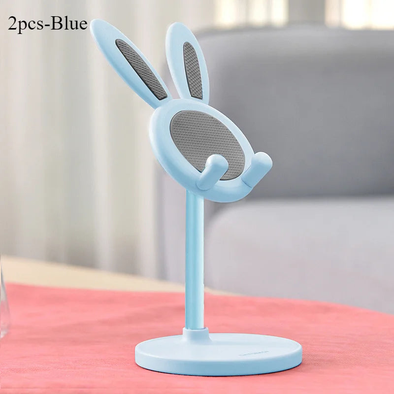 Light blue rabbit-shaped desktop phone stand with textured holder and round base