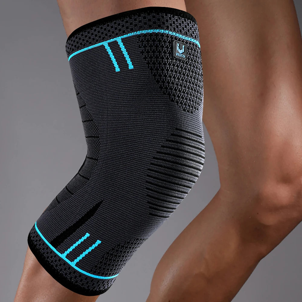 Black knee support sleeve with blue accent stripes and elastic compression fit