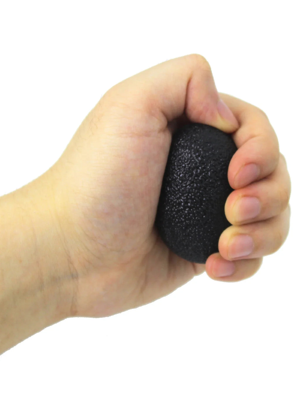 Black egg-shaped grip strength ball held in one hand for finger exercise