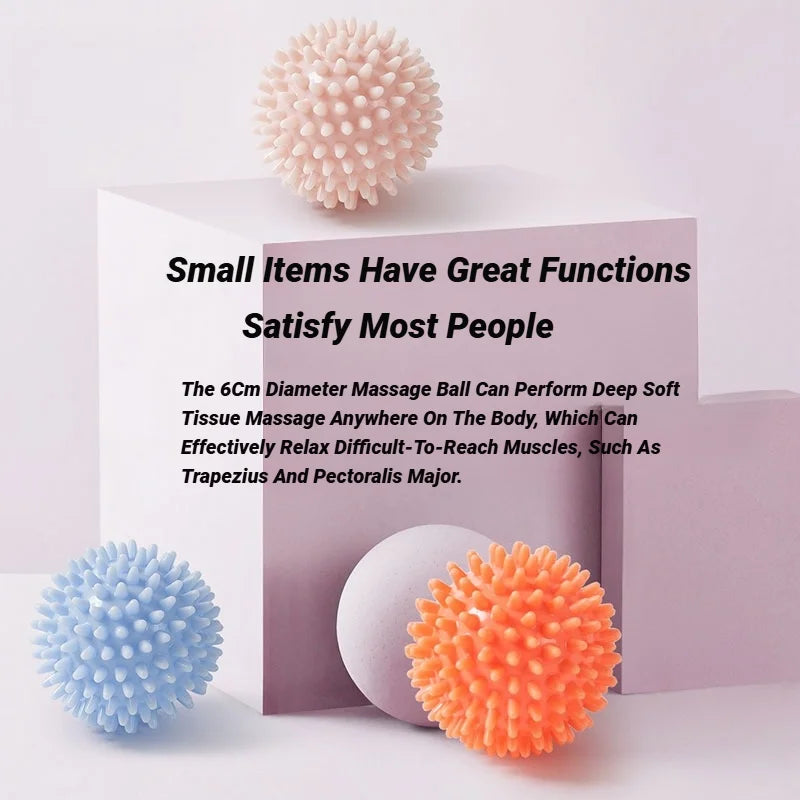 Set of spiky massage balls: white, blue, and orange round deep-tissue rollers