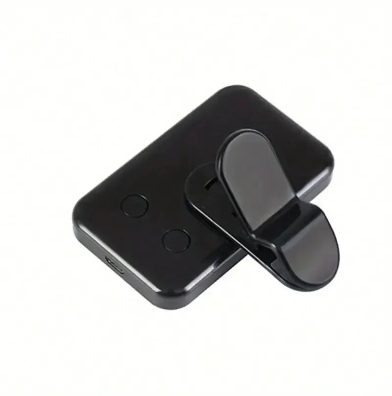 Black clip-on LED fill light with round base and phone clamp