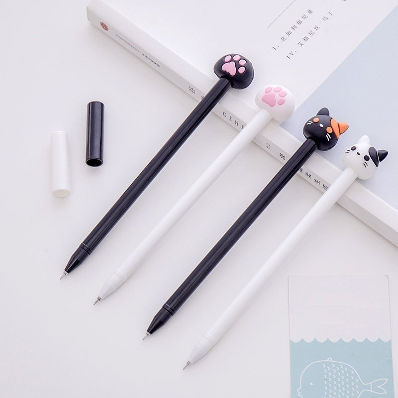 Kawaii cat gel pens, black and white barrels with paw toppers, fine point black ink