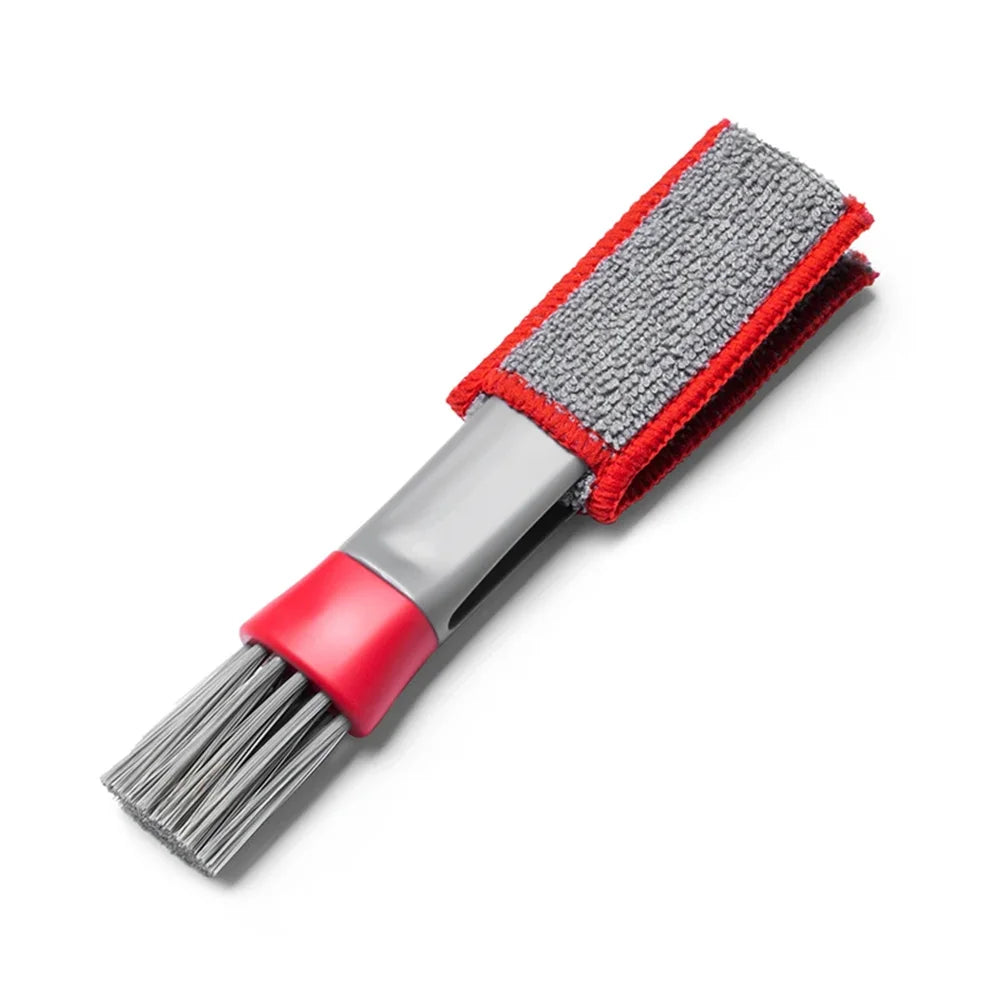 Car interior cleaning brush with gray pad insert and gray bristle head, red collar