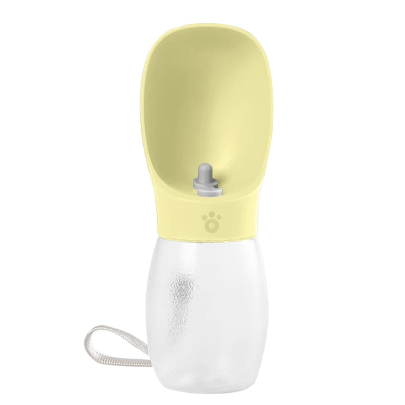 Yellow and white pet water bottle with integrated spout and carrying strap
