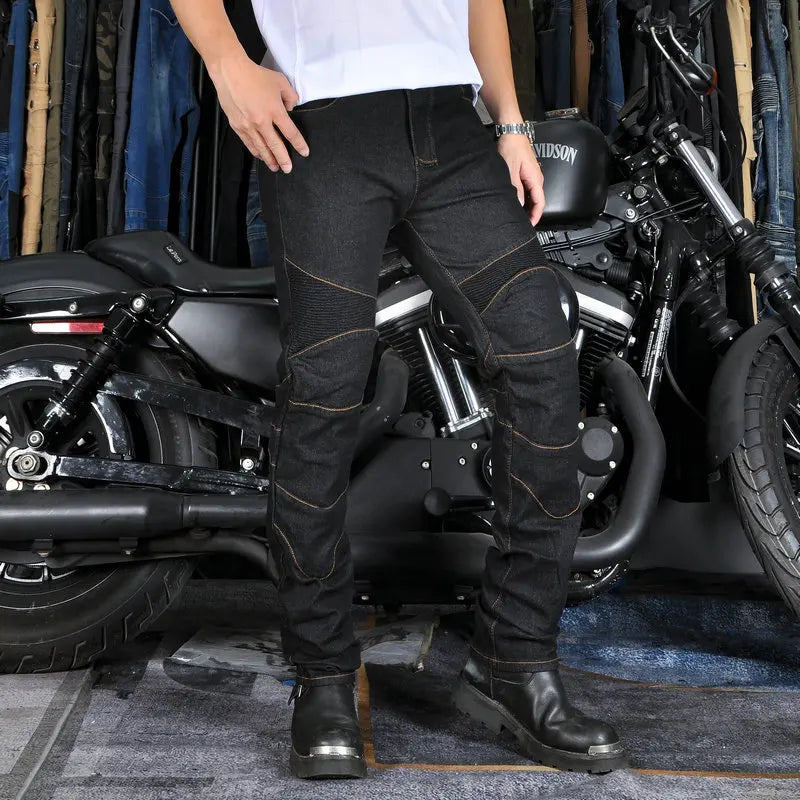 Black riding jeans with knee armor panels and reinforced side seams