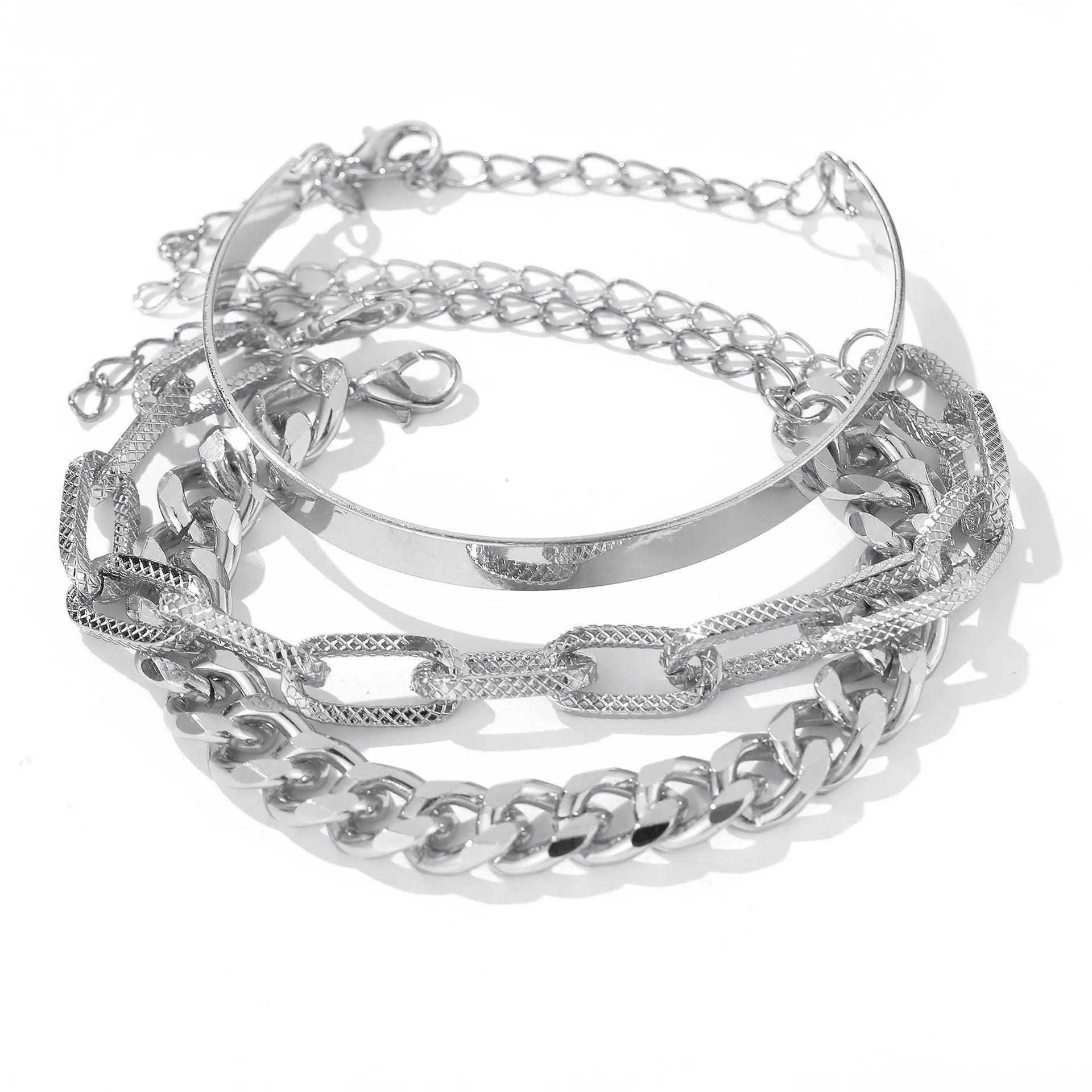 Silver open bangle bracelet set with layered chain links and textured cuff bands