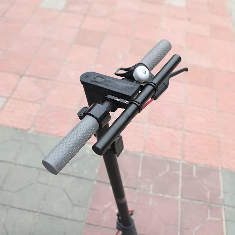 Bicycle handlebar extender bracket with phone/light holder mounted near the stem