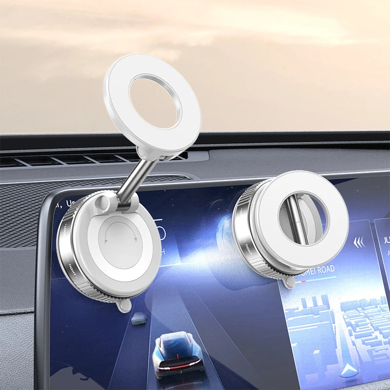 White magnetic car phone holder with suction mount on dashboard surface