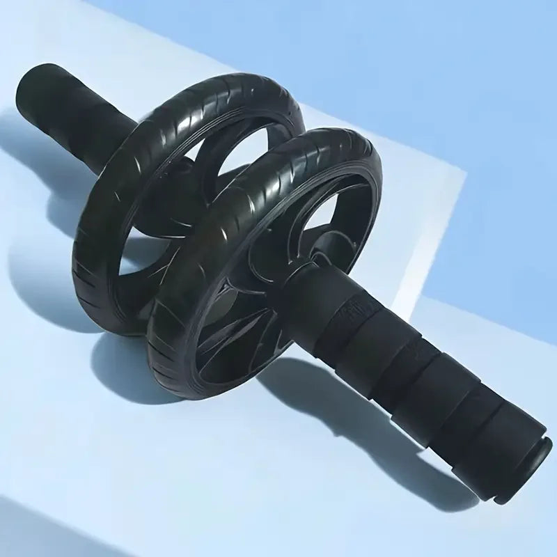 Black dual-wheel abdominal roller with padded foam handles and dual wheels
