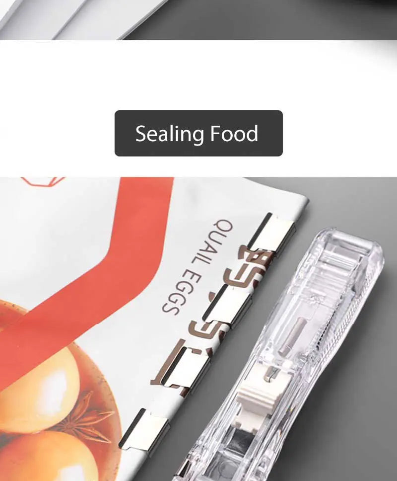 Clear mini push stapler tool clipping papers together on a card