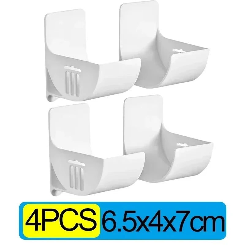 Four-pack white wall-mounted trash bag holders with curved clips