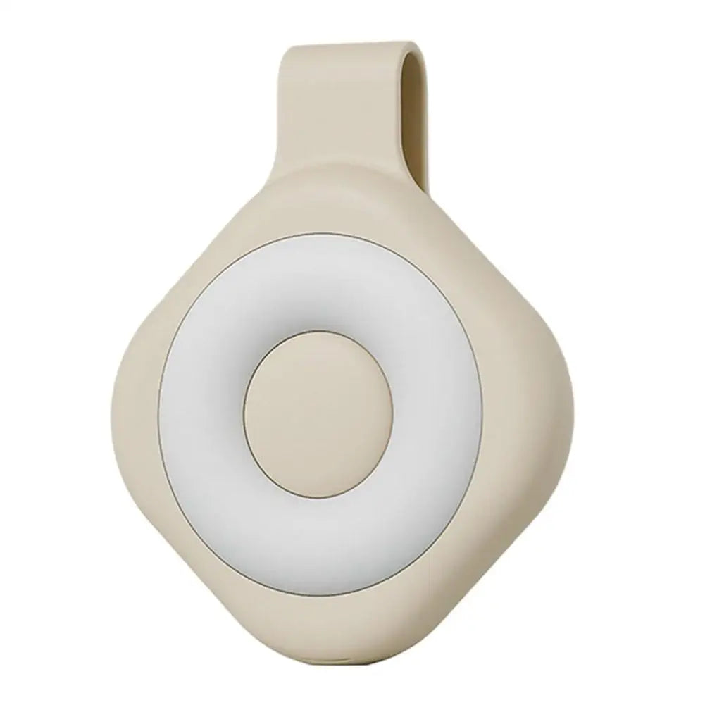 Beige mini magnetic LED phone light with white ring and pale center