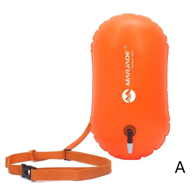 Inflatable swim buoy tow float in orange with shoulder strap and air valve