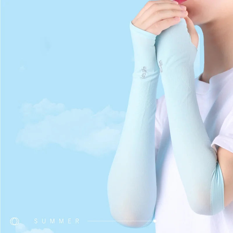 Light blue anti-UV arm sleeves with wide elastic cuffs held near wrist.
