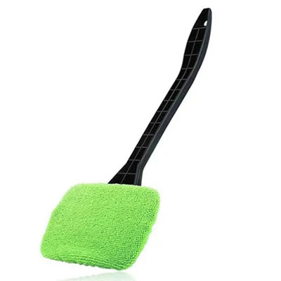 Car window cleaning brush with green microfiber pad and curved black long handle.