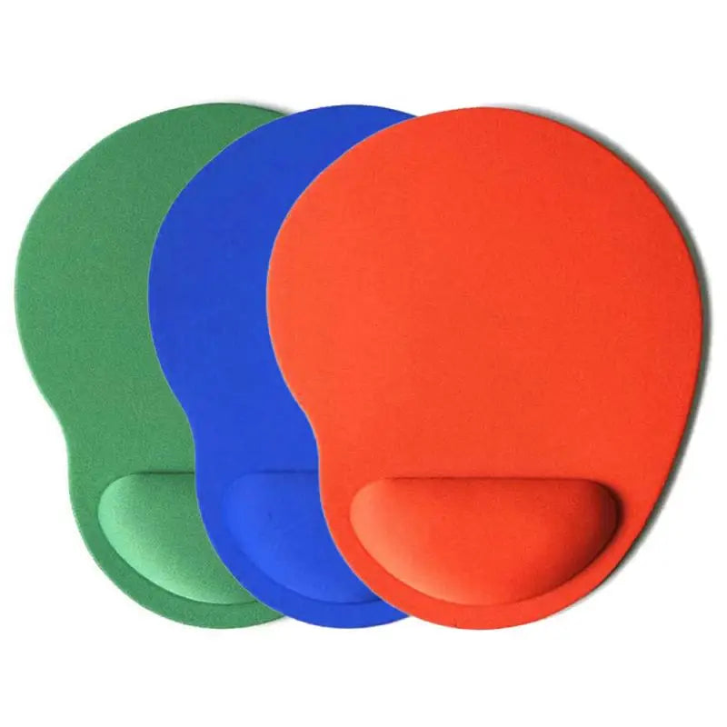 Set of colorful mouse pads with wrist rests: green, blue, orange, on white
