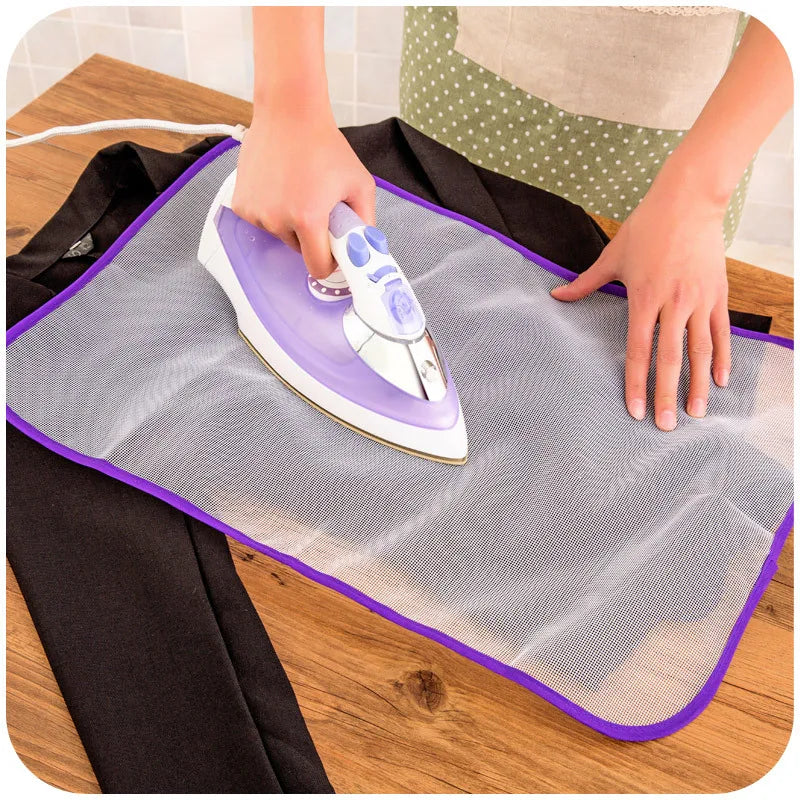 Protective ironing mat cover, gray mesh with purple edge border and steam iron pressing