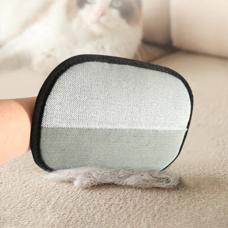 Double-sided pet grooming mitt showing gray brush fabric side with black trim and yellow tab