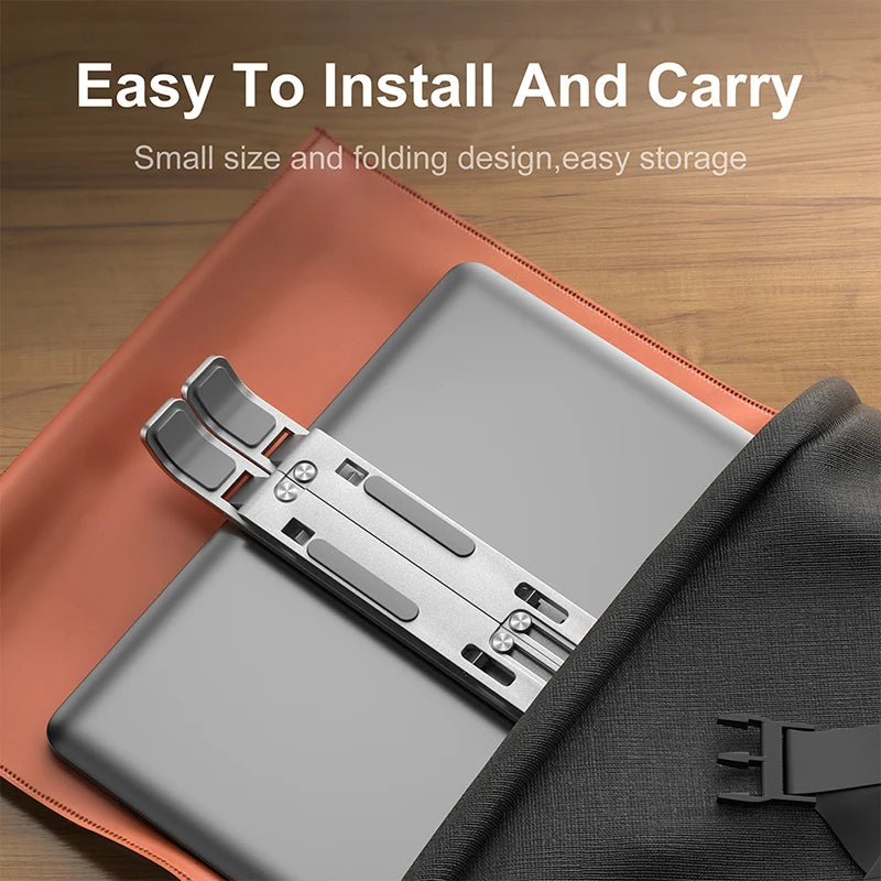 Silver foldable laptop stand with compact design and carry-ready fold support