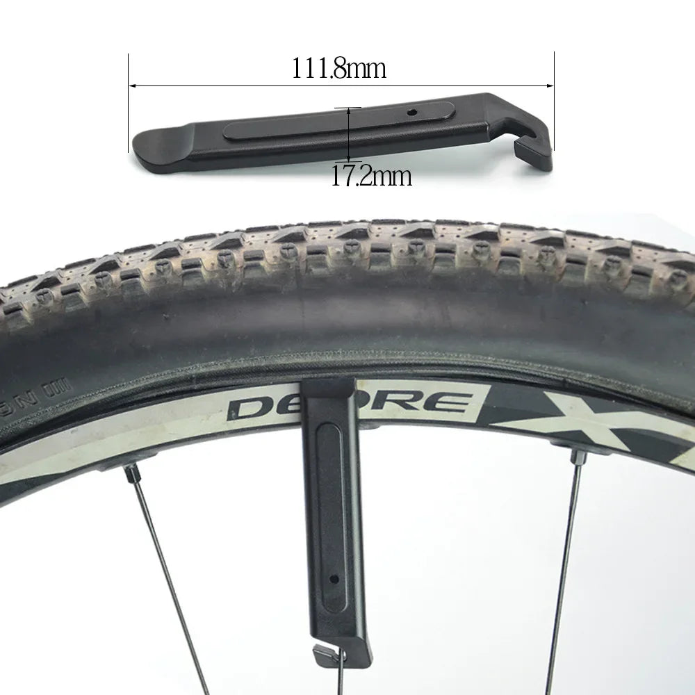 Bike tire lever tool with black handle and metal pry end